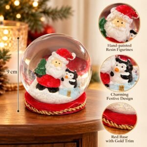 LED Christmas Snow Globe – Santa & Penguin Decoration with Red and Gold Base
