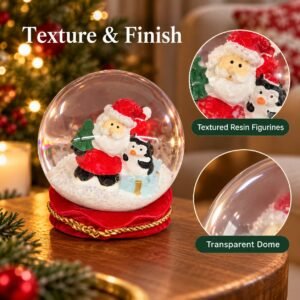 LED Christmas Snow Globe – Santa & Penguin Decoration with Red and Gold Base
